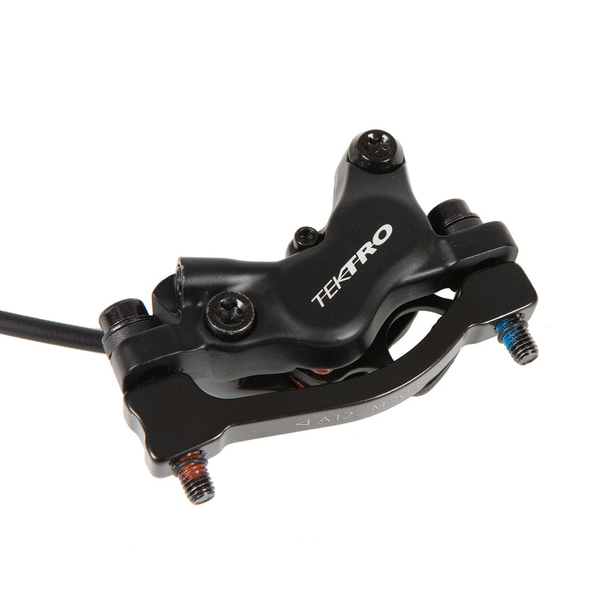 TEKTRO 4-piston hydraulic brake caliper close-up