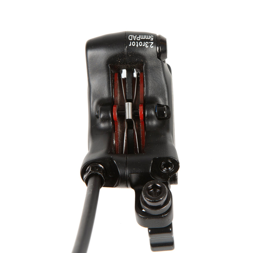 TEKTRO 4-piston caliper inner view showing brake pads
