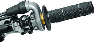 Close-up of motorcycle handlebar with throttle and grip on a white background