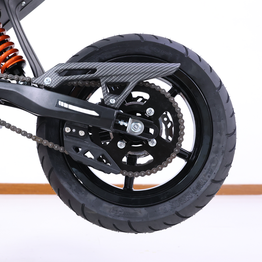 Valtinsu EM-5 rear street tire and chain guard installed on the bike