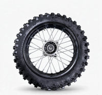 Valtinsu EM-5 rear knobby off-road tire mounted on a spoked wheel