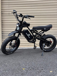 GhostCat BMX Kit F Series, black bike with BMX handlebars, side view