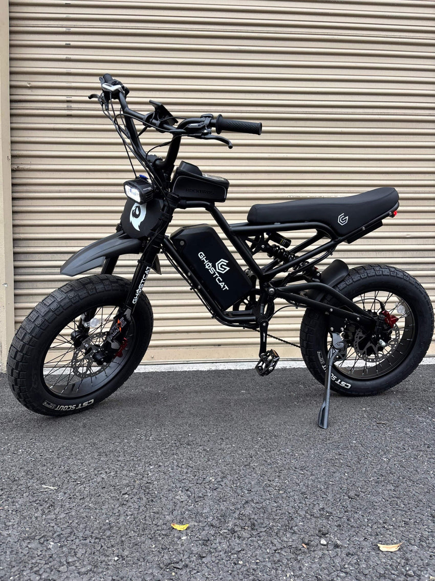 GhostCat BMX Kit F Series, black bike with BMX handlebars, side view