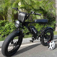 Freego E-Bike Waterproof Front Bag on a parked e-bike among palm plants