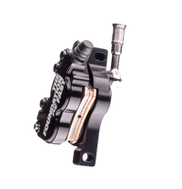 Formula EB7 front brake caliper detail – precision-machined alloy body with anodized finish