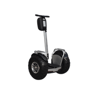 Freego X60 Plus in silver, angled side view with knobby tire and standing platform