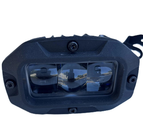 GhostCat Headlight, front view of the black triple LED lens housing