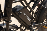 HappyRun battery mounted on an e-bike frame outdoors