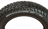 Maxxis MaxxVenture MT tire on a bike at sunrise