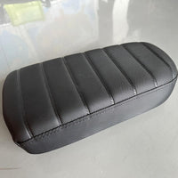 Freego Passenger Seat Cushion, black pleated rear seat, angled view