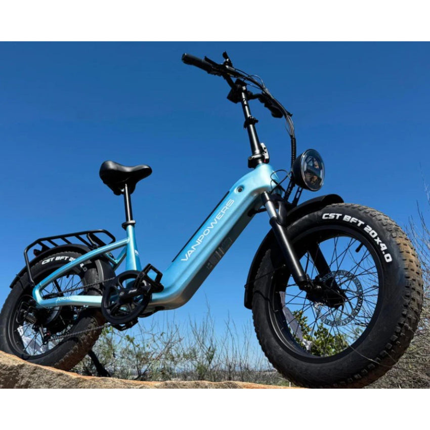 VanPowers Cycanon fat tire electric bike three-quarter front view showing classic cruiser styling