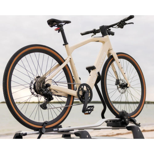 VanPowers UrbanCross Pro e-bike three-quarter front angle showing frame geometry and fork design