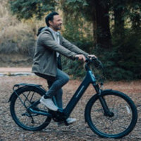 VanPowers UrbanGlide Pro urban electric bike lifestyle shot – commuting through West Jordan Utah