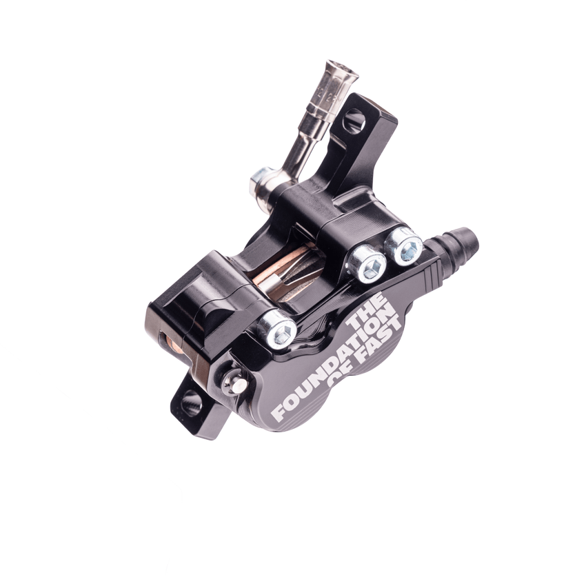 Formula EB9 brake caliper top angle showing pistons, pads and bleed fitting