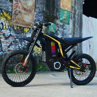 Freego Nova 4 electric dirt bike, front three-quarter view in an urban alley