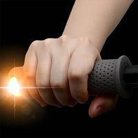 Freego Silicone Handle with Turn Signal glowing amber in a rider's hand at night