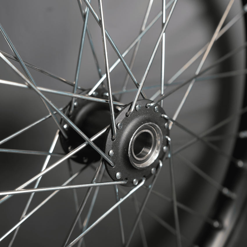 Rerode R1/R1 Plus 19" Front Wheel, close-up of hub and silver spokes