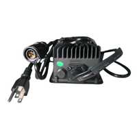Rerode R1 Charger, black charger with AC plug and output connector, angled view