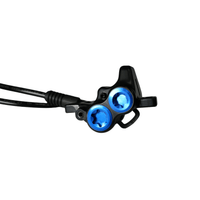 Rerode R1/R1 Plus Rear Brake Assembly, close-up of black caliper with blue pistons