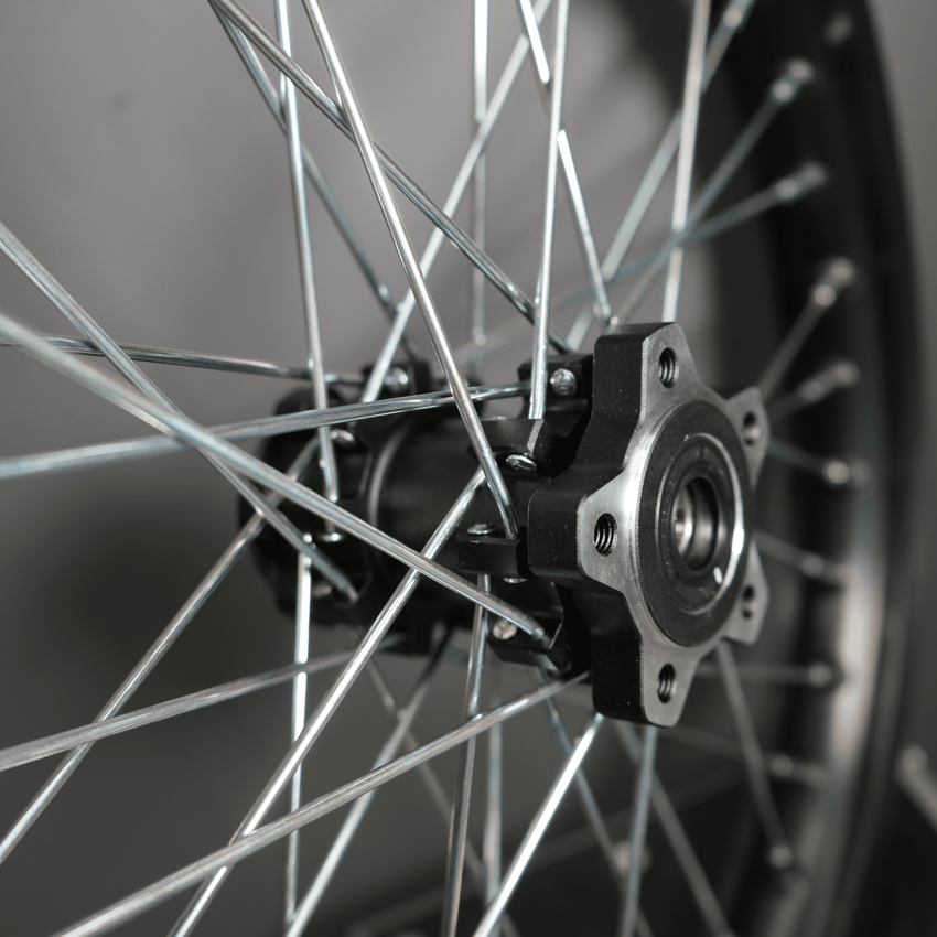 Rerode R1/R1 Plus 18" Rear Wheel, close-up of rear hub, bearing and silver spokes