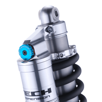 Formula TECH ER30 rear shock close-up of top mount, blue adjuster knob and TECH reservoir